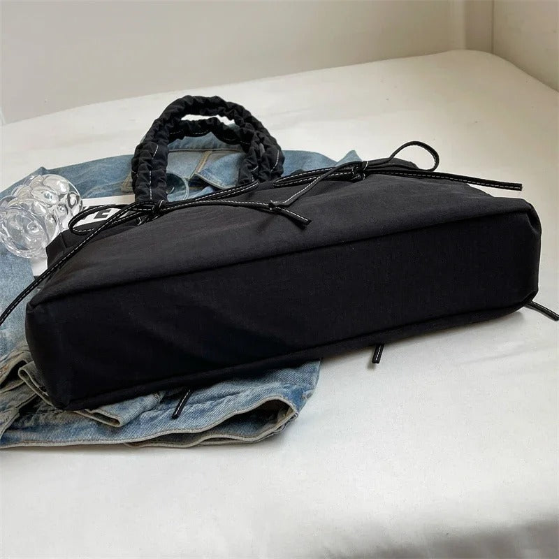 Asverra Noeda Tote Bag