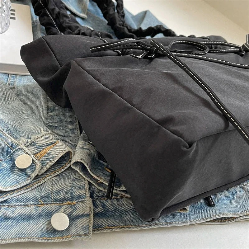 Asverra Noeda Tote Bag