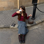 Briochelle Polka Dot Croissant Shoulder Bag - Chocolate Brown - sitting on the curb with coffee