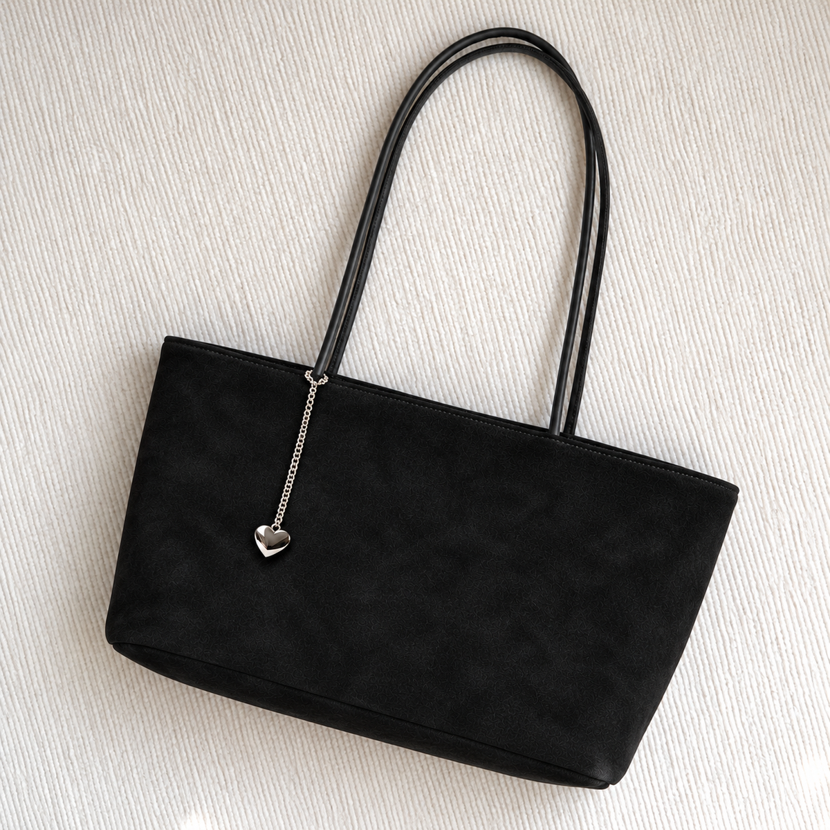 Daimée Suede-Look Shoulder Bag - Black - on a textured surface
