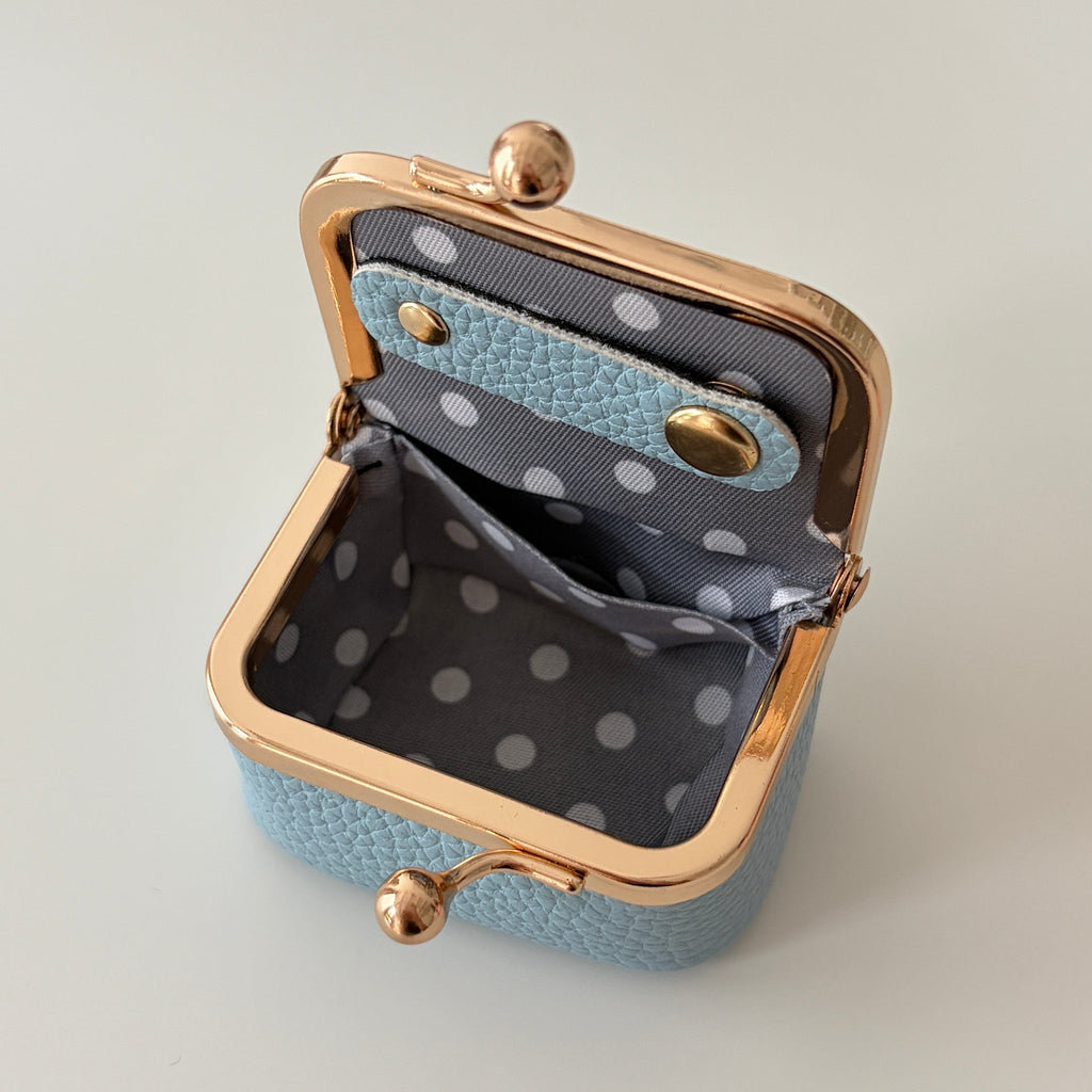 Écrinette Kiss-Lock Jewelry Case - empty inside view in Powder Blue