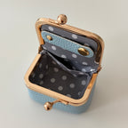 Écrinette Kiss-Lock Jewelry Case - empty inside view in Powder Blue