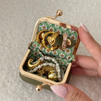 Écrinette Kiss-Lock Jewelry Case - open with jewellery in Olive Green