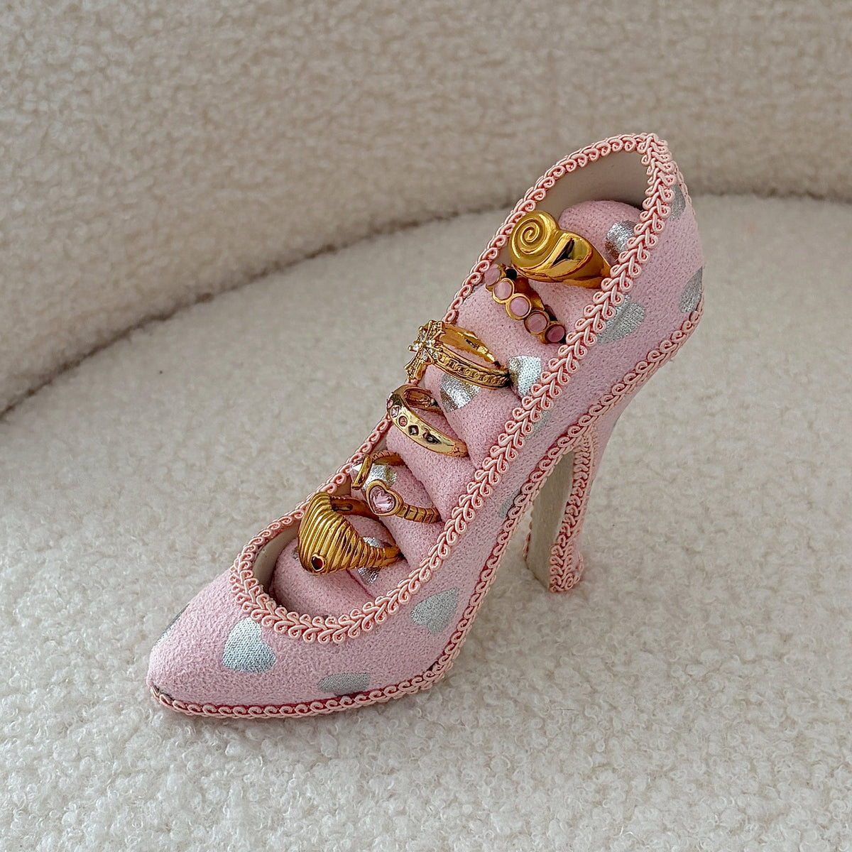 Escarpine High Heel Ring Holder - Heart Print holding rings on chair