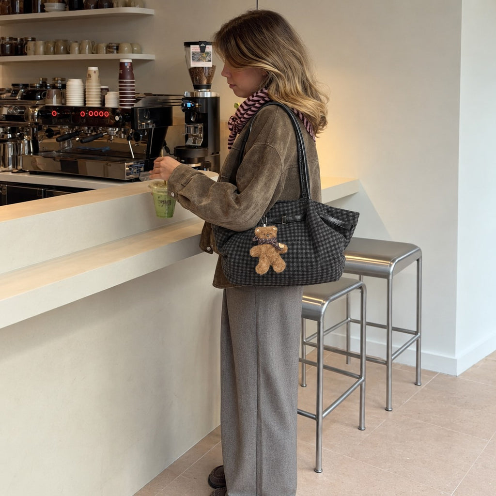 Oursette Teddy Charm Check Tote Bag - Charcoal Black - worn at a coffee bar