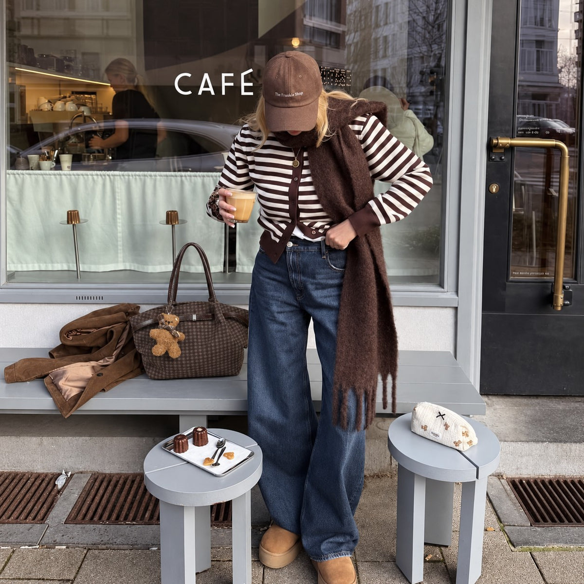 Oursette Teddy Charm Check Tote Bag - Mocha Brown - worn outside a cafe