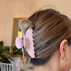 Strassina Polka Dot Rhinestone Hair Claw Clip - holding a twisted updo, back view