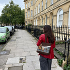 Tartinette Lace-Trim Plaid Tote Bag - Cocoa Plaid - worn on a city street with a red jacket