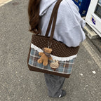 Tartinette Lace-Trim Plaid Tote Bag - Cocoa Plaid - carried with a grey hoodie