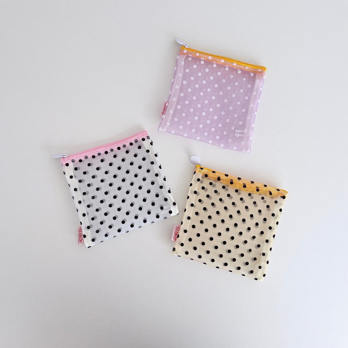 Tulléa Polka Dot Mesh Beauty Bag - all three colours flat lay