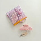 Tulléa Polka Dot Mesh Beauty Bag - Lavender Dot filled with hair accessories