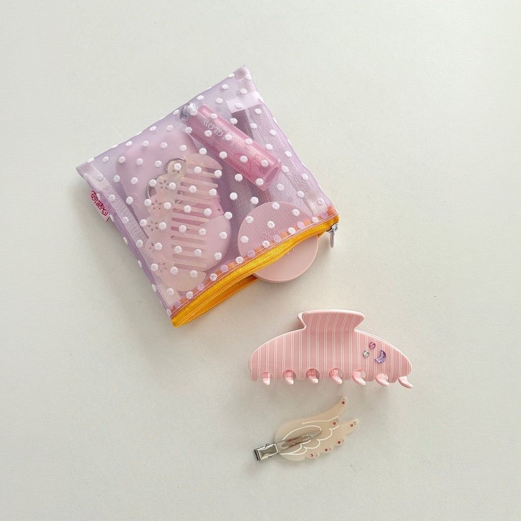 Tulléa Polka Dot Mesh Beauty Bag - Lavender Dot filled with hair accessories